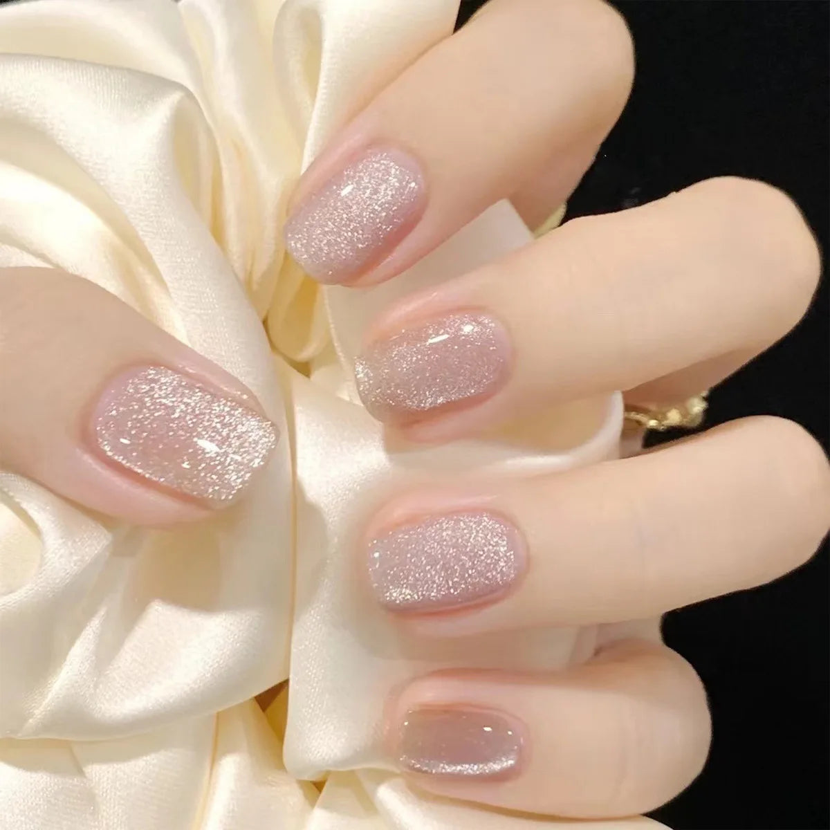 Hnewly 24Pcs Solid Color Grey Almond Fake Nail Cat's Eye Design Wearable Round Head False Nails with Shiny Powder Press on Nails
