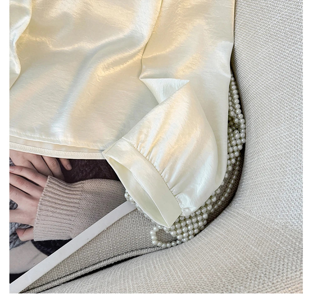 Hnewly  Elegant Satin Spliced Lace Shirt Women French Style Summer 2025 Doll Collar Pearl Single Breasted Light Luxury Long Sleeve Tops