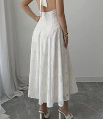 Hnewly  Women's Elegant and Minimalist Style Hanging Neck Strapless Long Skirt Dress Open Back with Tie Detail and Floral Pattern Dress